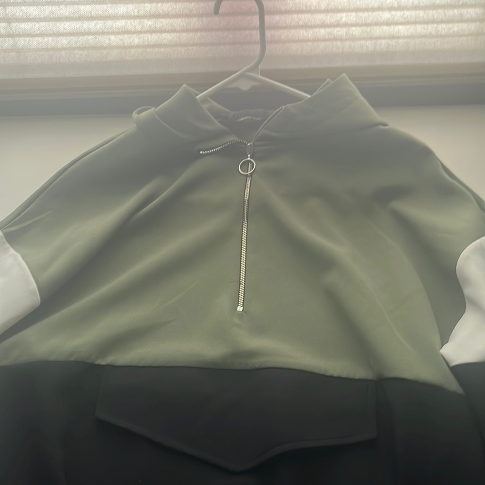 half zip green white and black